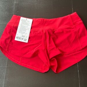 Red workout shorts size 4